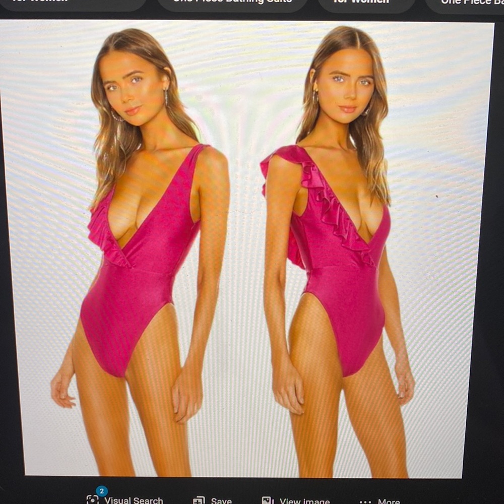 Tula Rosa Magenta One apiece Bathing Suit with Ruffle Detail  (never worn)